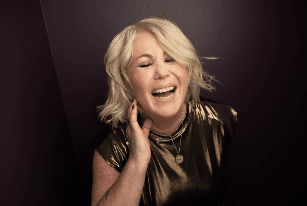 Photo of Jann Arden singing