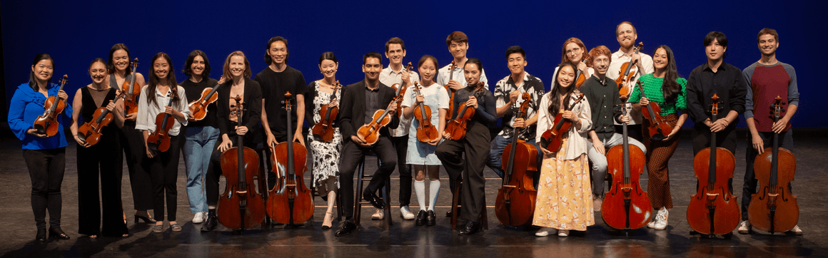Group photo of 2023 winners of the Musical Instrument Bank competition, posing on stage with their instruments.