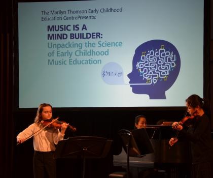 young girl playing violin