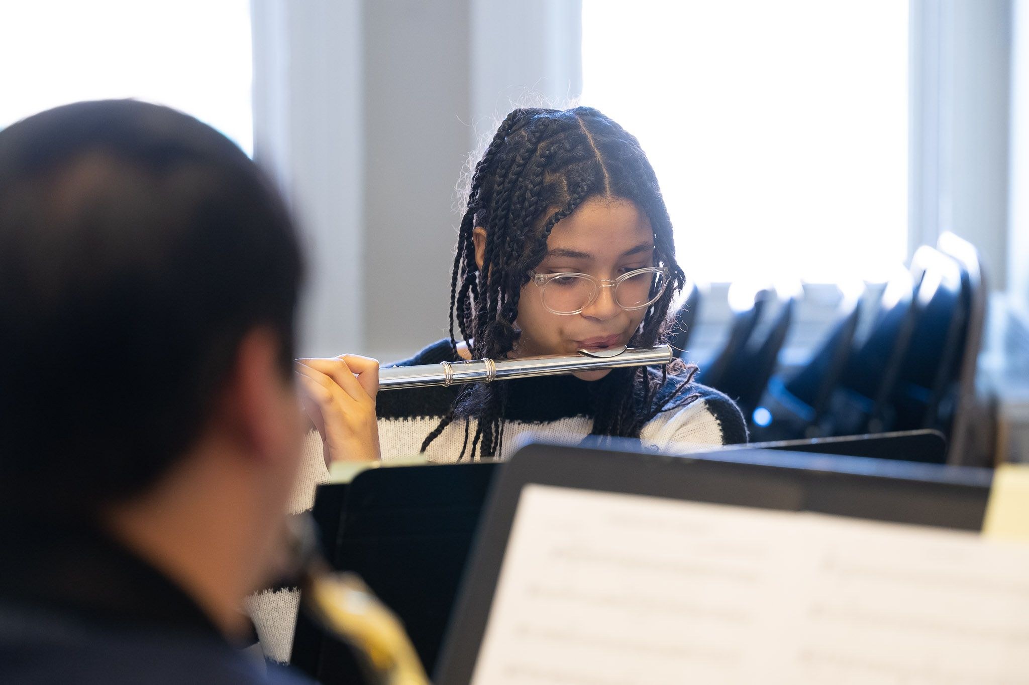 girl playing flute