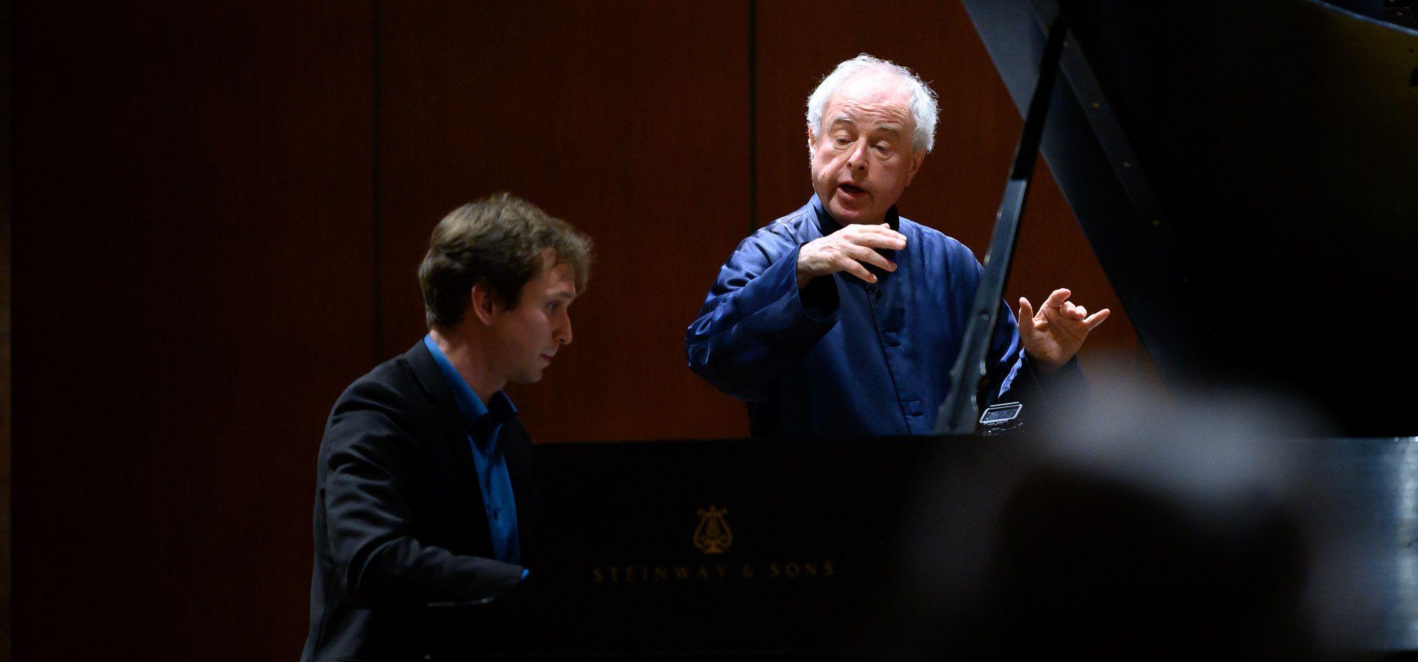 Professor teaching a student